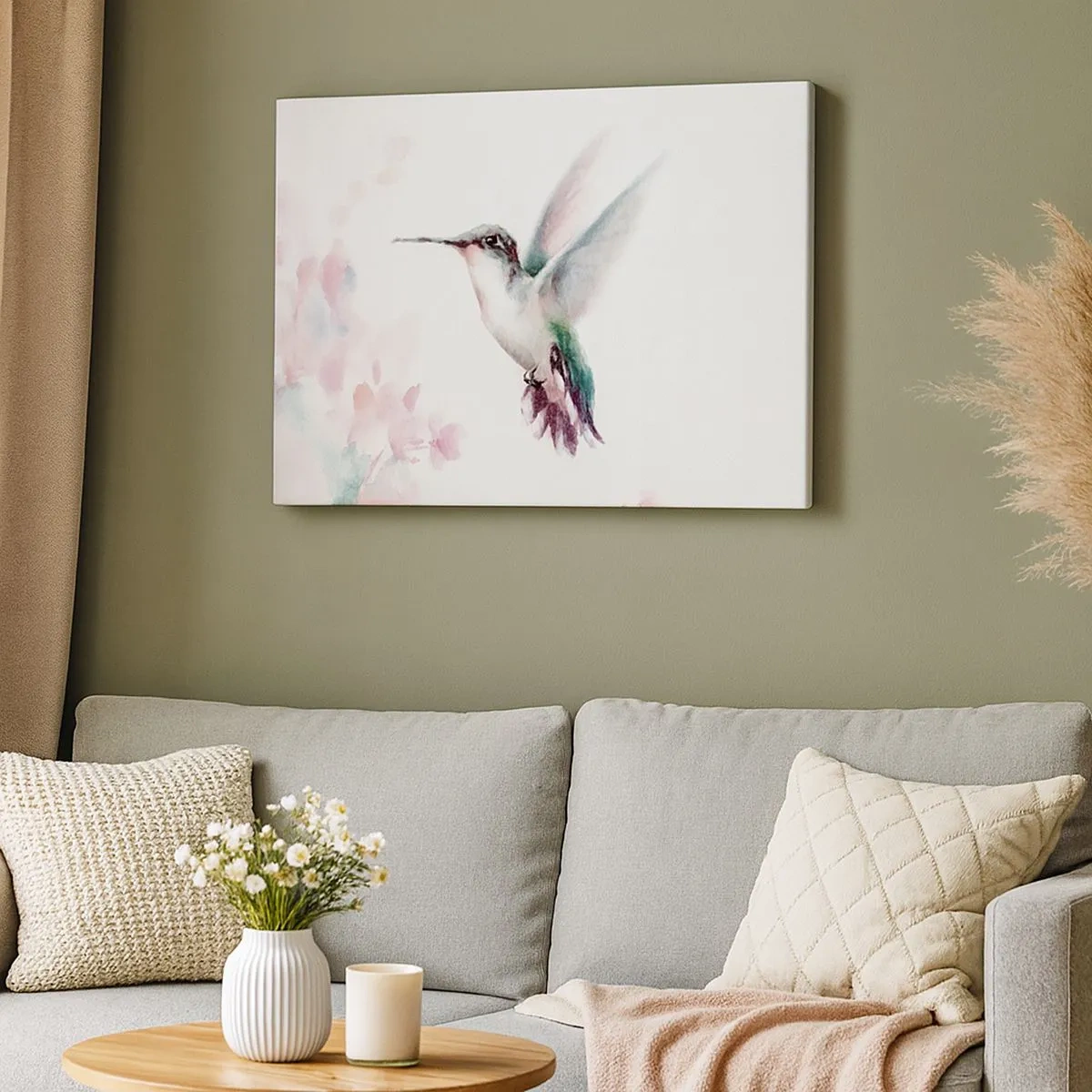 Bild auf Leinwand - Leinwandbild - Ein Kolibri in zarten Pastellfarben vor einem Hintergrund aus Blumen - 70x50cm - Im Flattern gehalten - Moderne Wanddekoration für Wohnzimmer und Schlafzimmer ARTTOR