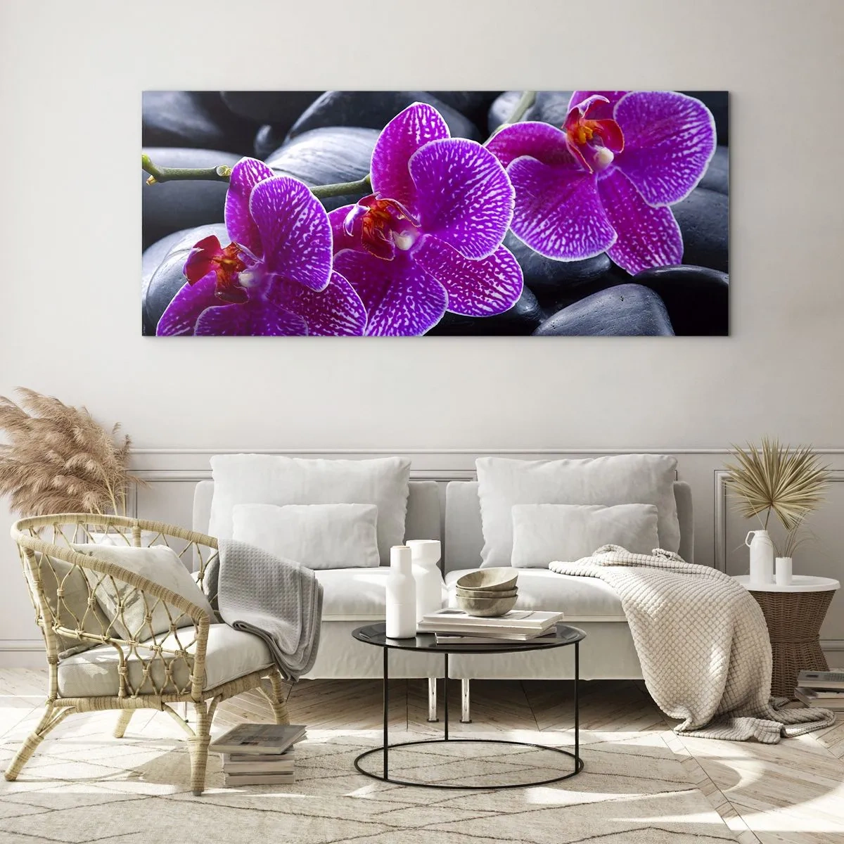 Glasbild - Bild auf glas - Lila Orchideen vor einem Hintergrund aus schwarzen Steinen - 120x50cm - Die Steine