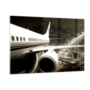 Glasbild - Bild auf glas - Ein Flugzeug über der Stadt bei Nacht mit Industrieatmosphäre - 120x80cm - In die Nacht fliegen - Moderne Wanddekoration für Wohnzimmer und Schlafzimmer ARTTOR