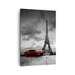 Bild auf Leinwand - Leinwandbild - Rotes Retro-Auto vor dem Eiffelturm in Schwarz und Weiß - 70x100cm - Vor nicht allzu langer Zeit in Paris - Moderne Wanddekoration für Wohnzimmer und Schlafzimmer ARTTOR