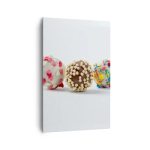 Bild auf Leinwand - Leinwandbild - Bunte Pralinen mit Dekorationen auf weißem Hintergrund - 80x120cm - Das Leben kann süß sein - Moderne Wanddekoration für Wohnzimmer und Schlafzimmer ARTTOR