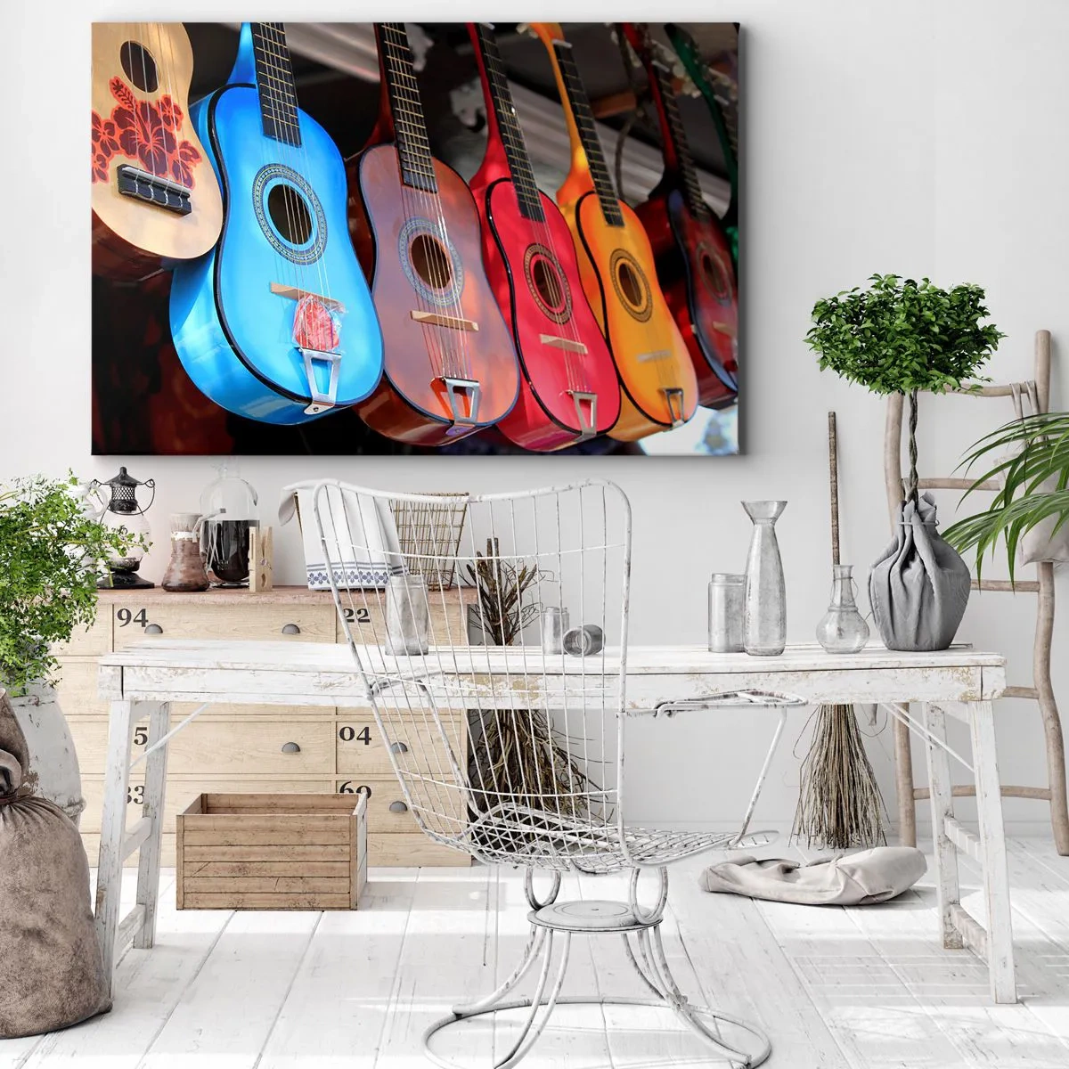 Bild auf Leinwand - Leinwandbild - Bunte Akustikgitarren hängen in einer Reihe auf dem Display - 70x50cm - Lateinische Atmosphäre - Moderne Wanddekoration für Wohnzimmer und Schlafzimmer ARTTOR