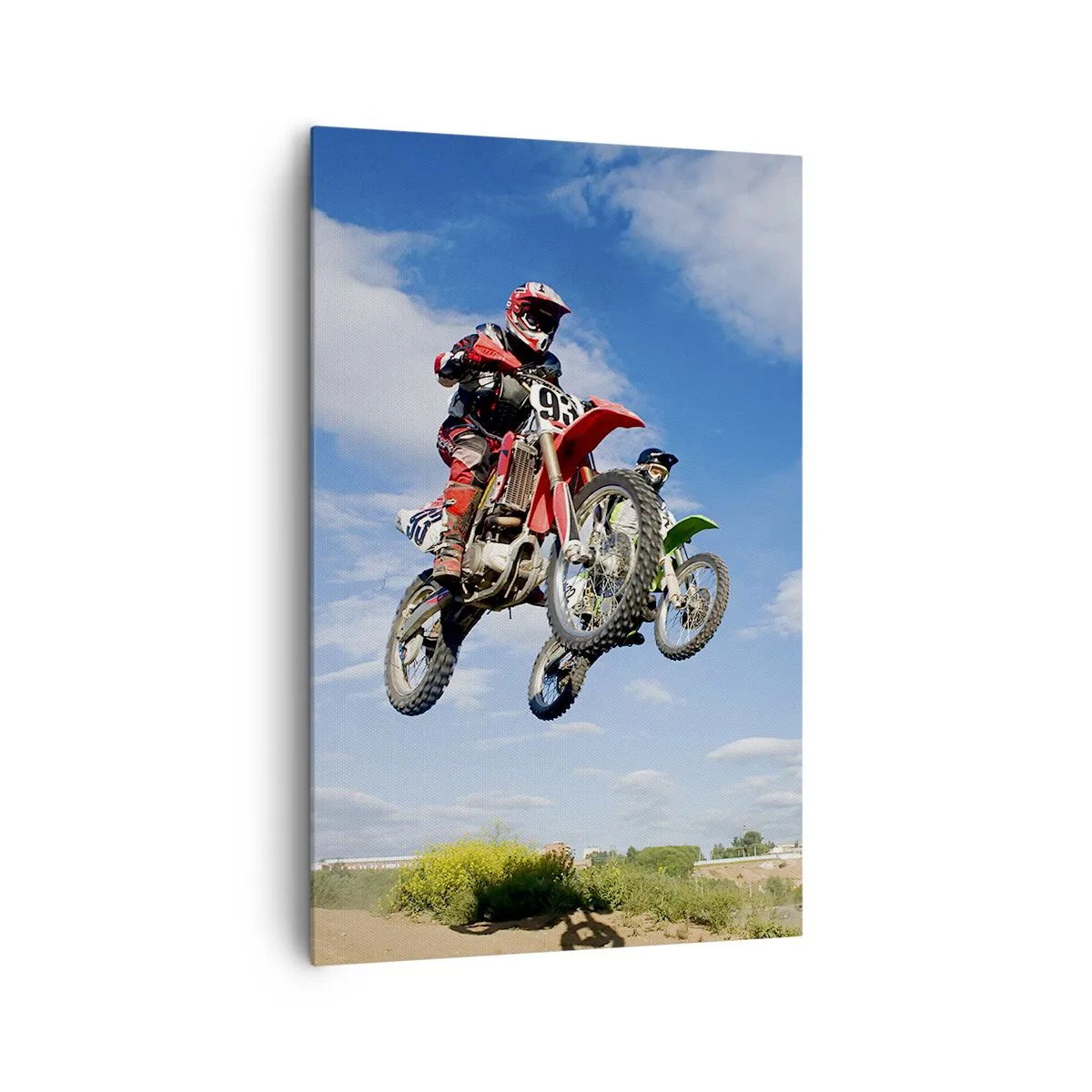 Bild auf Leinwand - Leinwandbild - Fahrer auf Motocross-Motorrädern in der Luft während eines Sprunges - 80x120cm - Himmelssprung - Moderne Wanddekoration für Wohnzimmer und Schlafzimmer ARTTOR