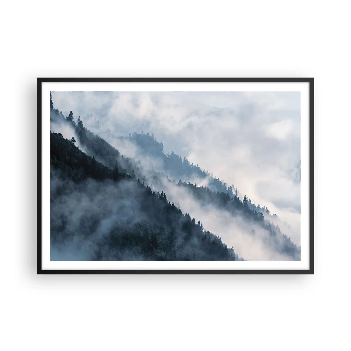 Poster in einem schwarzem Rahmen - Nebel schwebt über den bewaldeten Berghängen in einer geheimnisvollen Landschaft - 100x70cm - Mystik der Berge - Moderne Wanddekoration für Wohnzimmer und Schlafzimmer ARTTOR
