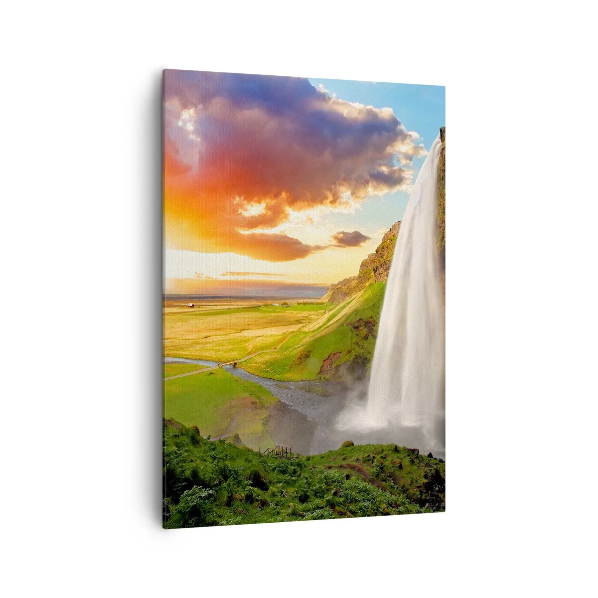Bild auf Leinwand - Leinwandbild - Ein Wasserfall in einer malerischen Landschaft bei Sonnenuntergang - 70x100cm - Die Fülle des isländischen Sommers - Moderne Wanddekoration für Wohnzimmer und Schlafzimmer ARTTOR