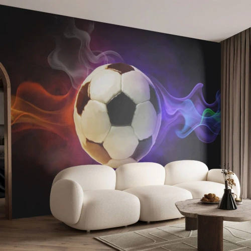 Fototapete Premium Sand - Ein Fußball, umgeben von bunten Lichteffekten - 100x70cm - Die magische Kraft des Spiels - Moderne Wanddekoration für Wohnzimmer und Schlafzimmer ARTTOR