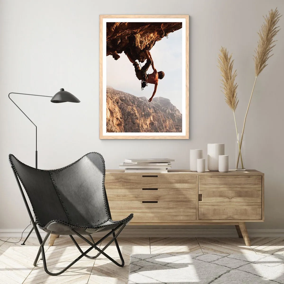 Poster in einem Rahmen aus heller Eiche - Die Welt ist in einer Hand auf einem Felsblock geschrumpft - 50x70 cm