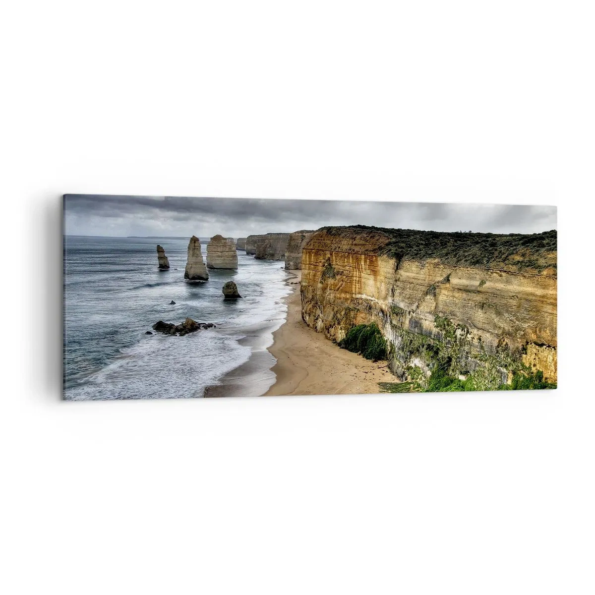 Bild auf Leinwand - Leinwandbild - Steilküste mit Strand und Felsformationen - 140x50cm - Rohe Schönheit - Moderne Wanddekoration für Wohnzimmer und Schlafzimmer ARTTOR