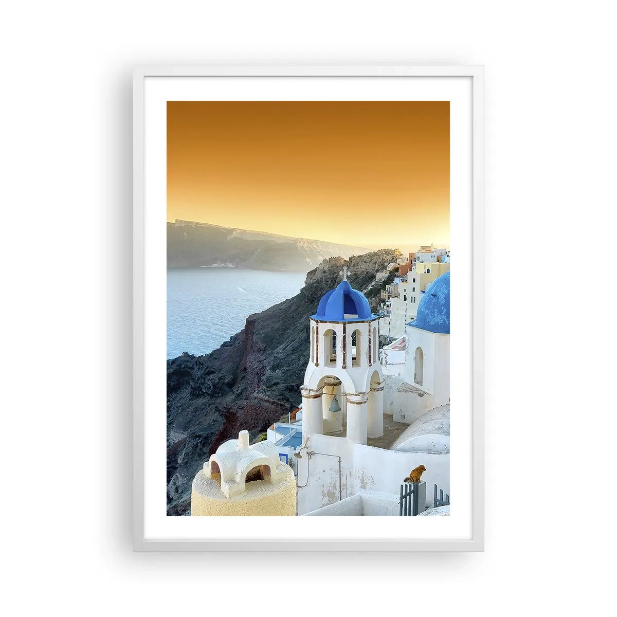 Poster in einem weißen Rahmen - Santorini - an die Felsen gekuschelt - 50x70 cm